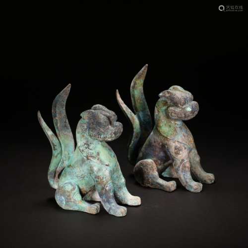 A PAIR OF CHINESE BRONZE LIONS,  NORTHERN AND SOUTHERN DYNAS...