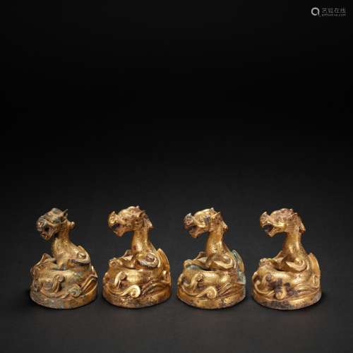 A SET OF CHINESE BRONZE GILT PAPERWEIGHTS, HAN DYNASTY