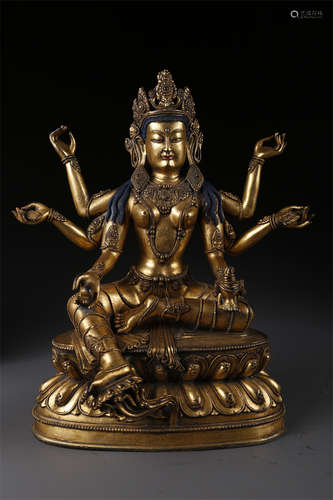 A Gilt Copper Vasudhara Buddha Statue.