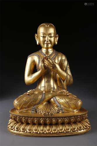 A Gilt Copper Guru Buddha Statue.