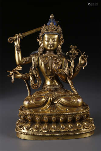 A Gilt Copper Manjusri Bodhisattva Statue.