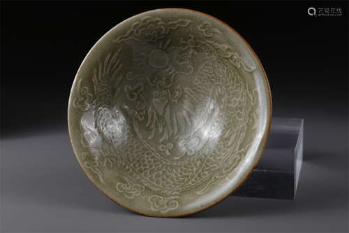 A Porcelain Bowl with Carved Flowers Design.