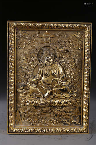 A Gilt Copper Buddha Statue.