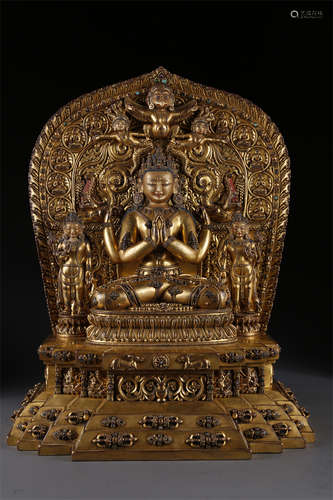 A Gilt Copper Four-Arm Avalokitesvara Statue.