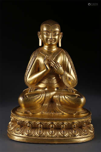 A Gilt Copper Guru Buddha Statue.