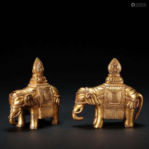 A PAIR OF CHINESE BRONZE GILT ELEPHANTS, MING DYNASTY