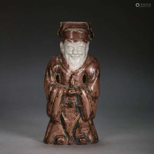 CHINESE RED-GLAZED PORCELAIN FIGURE, MING DYNASTY