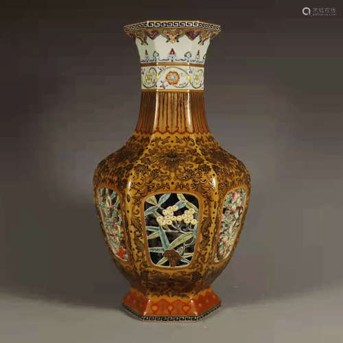 A wood-grain glaze hollow hexagonal vase made in Qianlong ye...