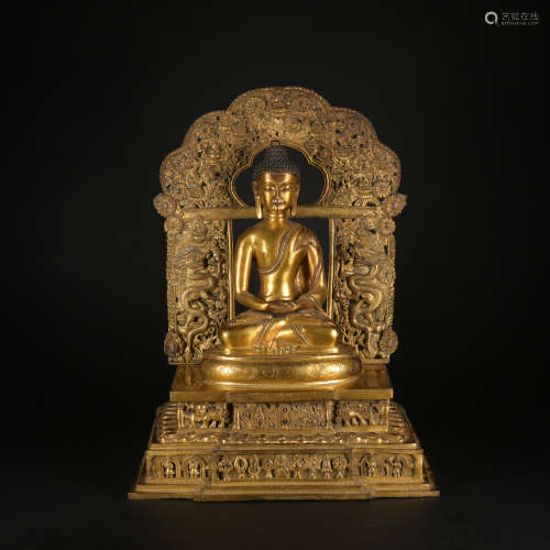 A gilt-bronze statue of Amitabha Buddha