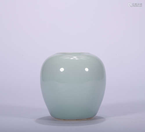 A celadon-glazed vase