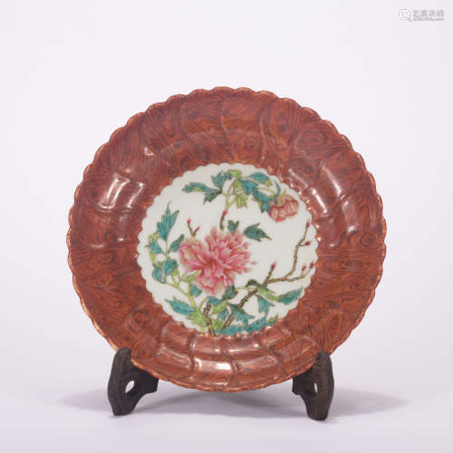 A wooden glazed 'floral and birds' dish