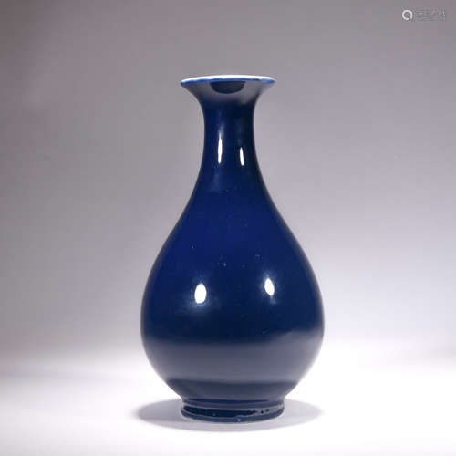 A blue glazed pear-shaped vase