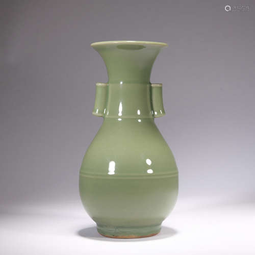 A celadon-glazed vase