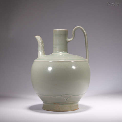 A celadon-glazed pot