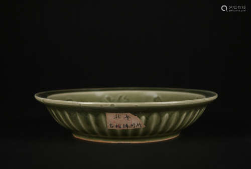 A celadon-glazed dish