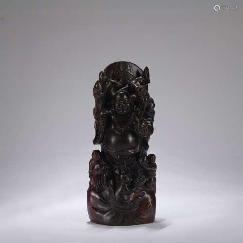 A red sandalwood statue of buddha