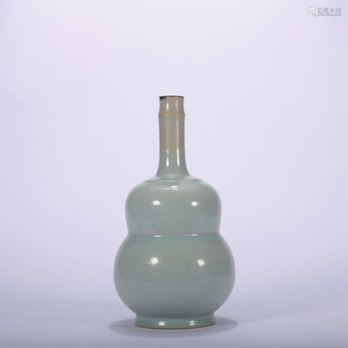 A celadon-glazed vase