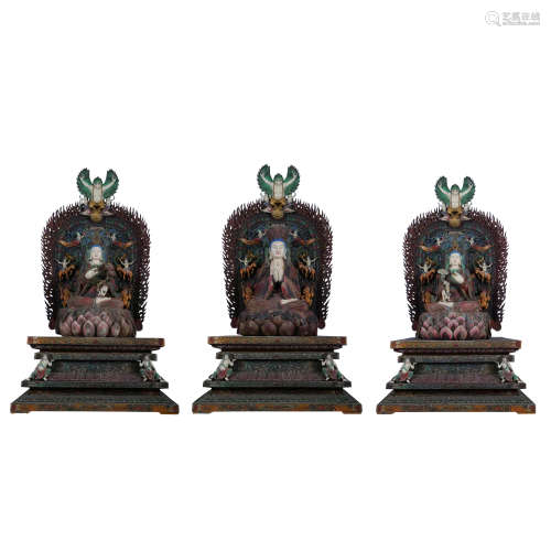 A GROUP OF WOOD CARVED AND PAINTED BUDDHIST STATUES, QING DY...