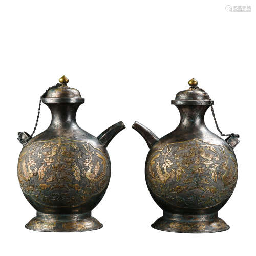 A PAIR OF CHINESE TANG DYNASTY SILVER PARTIAL GILT POTS, 7TH...