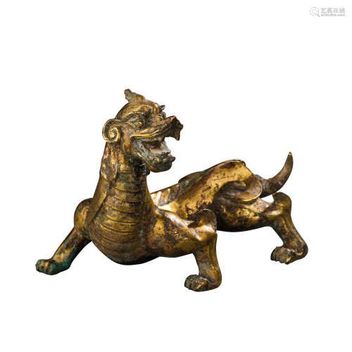 A PAIR OF CHINESE HAN DYNASTY GILT BRONZE BEASTS