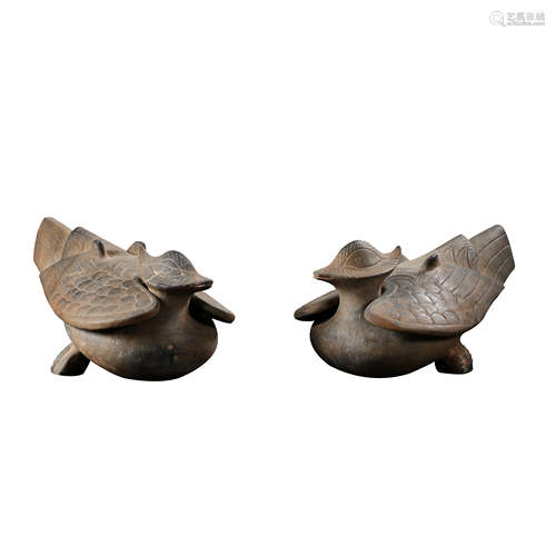 A PAIR OF CHINESE TANG DYNASTY BLUESTONE CARVED BIRDS