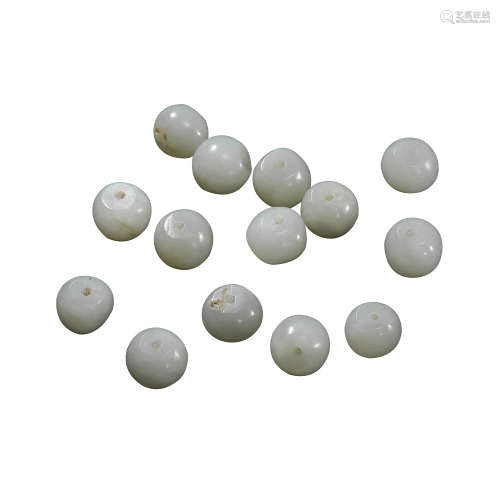 A SET OF CHINESE LIAO AND JIN DYNASTIES HETIAN JADE BEADS