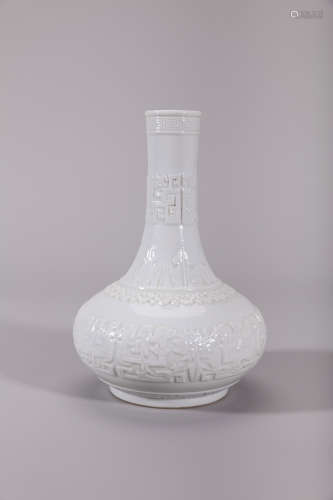 White Glaze Incised Interlocking Lotus Bottle Vase, Qing Qia...