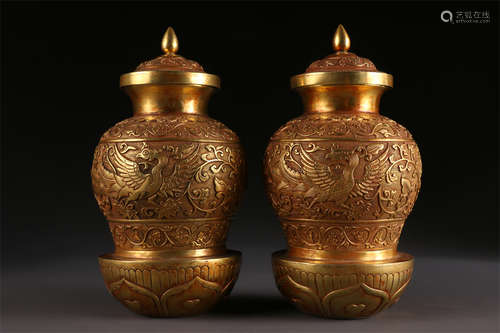 A Pair of Gilt Copper Lidded Jars.