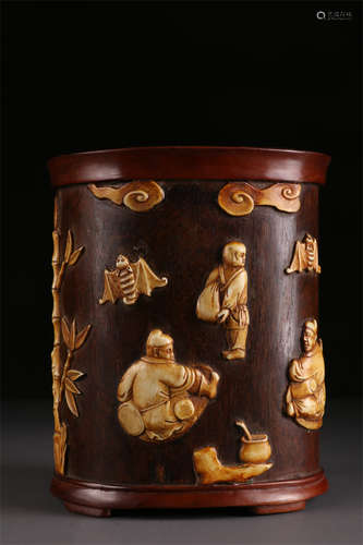 A Narra Wood Brush Pot with Figure Design.