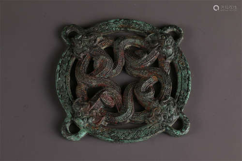 A Bronze Accessory with Dragon Design.