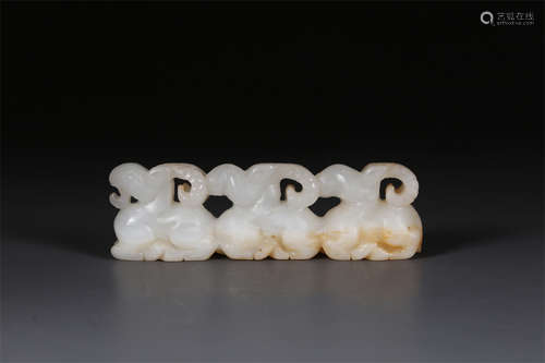 A Hetian White Jade Goat-Shaped Brush Rack.