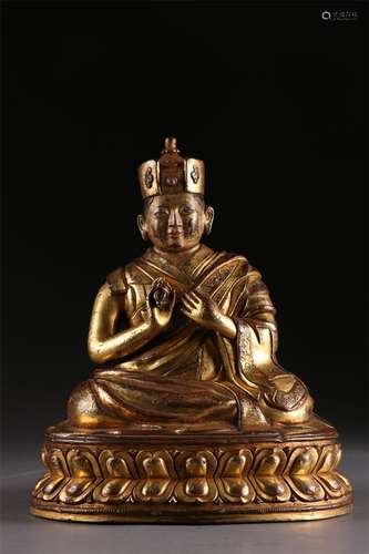 A Gilt Copper Guru Buddha Statue.