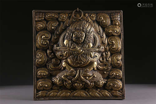 A Gilt Copper Two-Arm Mahakala Buddha Plate.