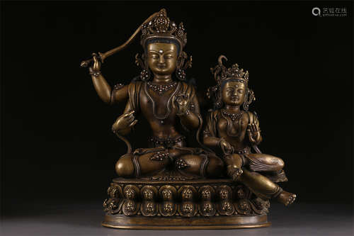 A Manjusri Bodhisattva and Attendant Statue.