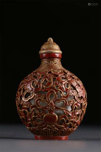 An Iron-Red Porcelain Snuff Bottle.