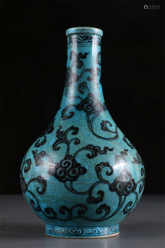 A Peacock Blue Glazed Long-Neck Bottle.