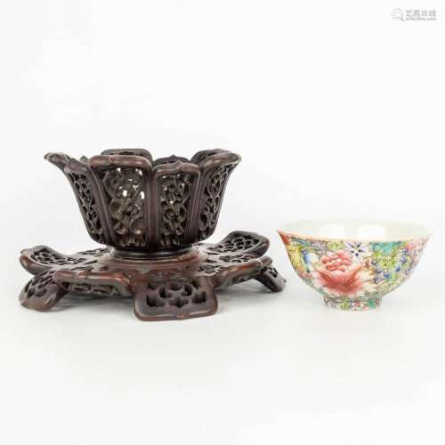 A Chinese porcelain bowl with a floral decor in a sculptured...