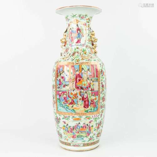 A Chinese Canton vase made of porcelain and decorated with s...