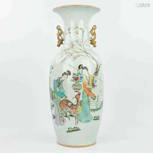 A Chinese vase made of porcelain and decorated with ladies a...