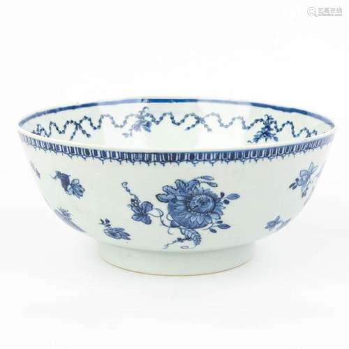 A large Chinese bowl made of porcelain and decorated with fl...