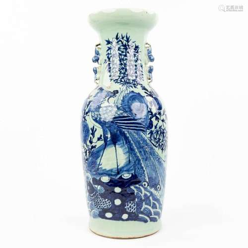 A Chinese vase with a blue-white decor of fauna and flora. (...