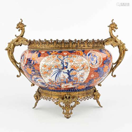 A table centrepiece made of Imari porcelain mounted with bro...