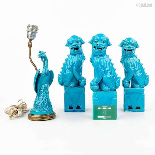 A collection of 3 foo dogs and a phoenix, made of glazed sto...