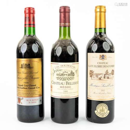 A collection of 3 bottles of red wine.