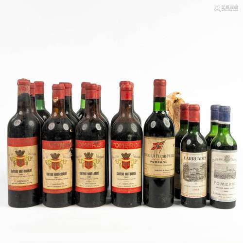 A collection of vintage wine bottles 'Chateau La Fleur P...