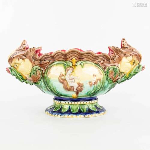 A cache-pot flower pot made of glazed faience in art nouveau...