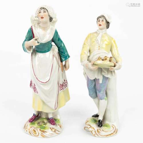 A pair of statues made of porcelain made in Germany and mark...