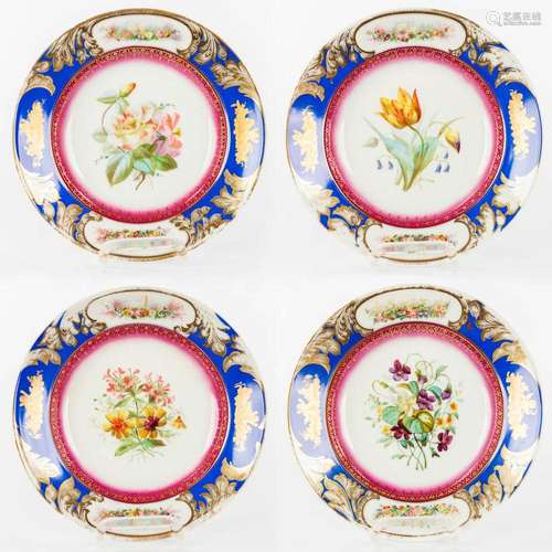 A collection of 4 plates made of porcelain and decorated wit...