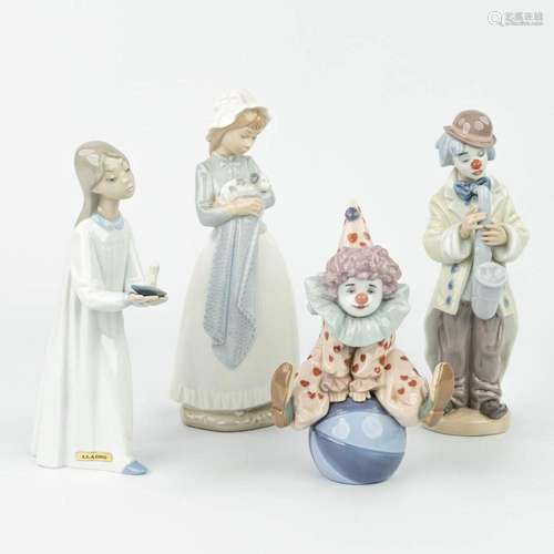 A collection of 4 figurines made of porcelain in Spain and m...