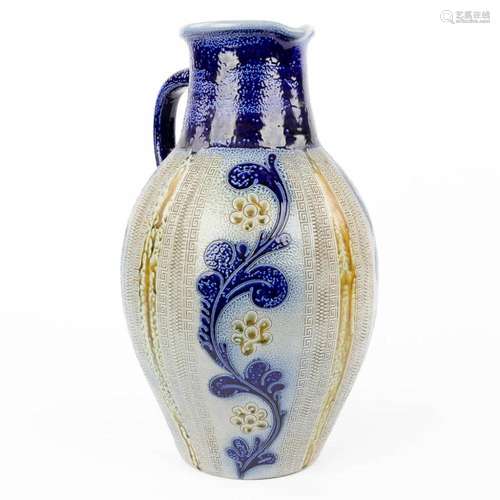 A large vase made of German grès, with blue glazed decor.